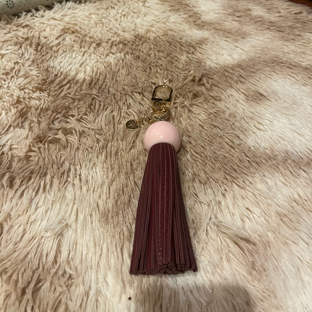 Tory Burch resin Pink/Maroon and  Gold Tasseled  Keychain